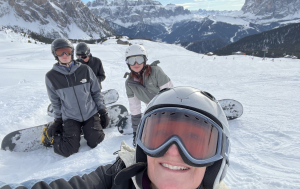 Deborah snowboarding with her three children
